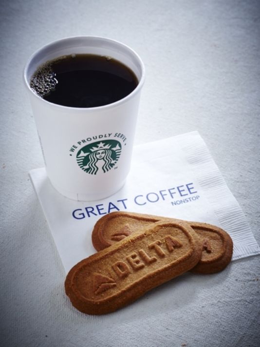 Starbucks coffee cup with Delta shortbread cookies